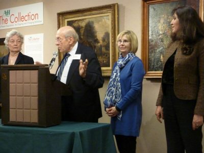 Ágoston Molnár introducing the curators of The Collection; Margaret Pápai, librarian on the left
