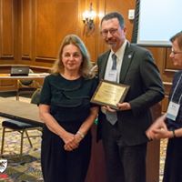 The Péter Basa Award of the AHEA presented to Louise O. Vasváry by James Niessen