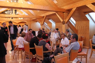 Attendees socializing at the banquet