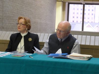 Katalin Vörös and Kálmán Magyar at the registration table